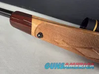 9398  Browning X Bolt, 270 Cal, 22” barrel, Rosewood cap, muzzle brake, Leupold 3.5x10x40 , Tiger striped wood, with box, Mor