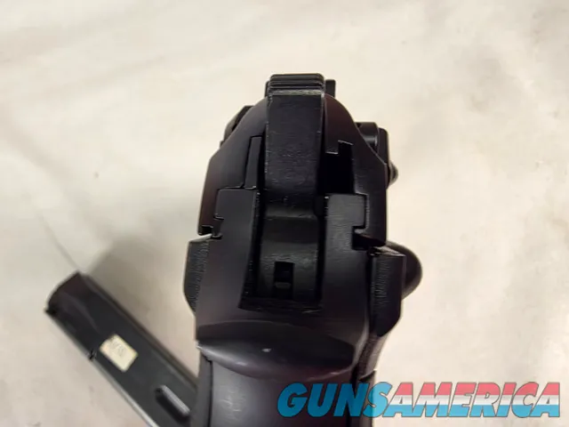 9487  Beretta 92FS, 9MM, 5” barrel, 2 Magazines 15 rounds each, laser in grip. Rubber grips. 