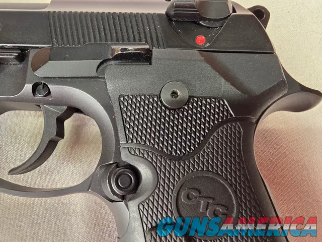 9487  Beretta 92FS, 9MM, 5” barrel, 2 Magazines 15 rounds each, laser in grip. Rubber grips. 