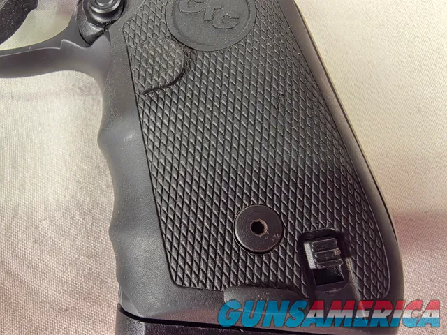 9487  Beretta 92FS, 9MM, 5” barrel, 2 Magazines 15 rounds each, laser in grip. Rubber grips. 
