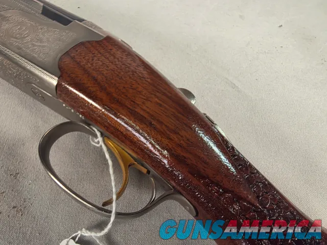 9402 Beretta Silver Pigeon I, 12 Gauge, 26” barrels, custom checkering, Screw in chokes, 3 SK, 2 Mod, full, 2 IC, 14 ½ LOP,