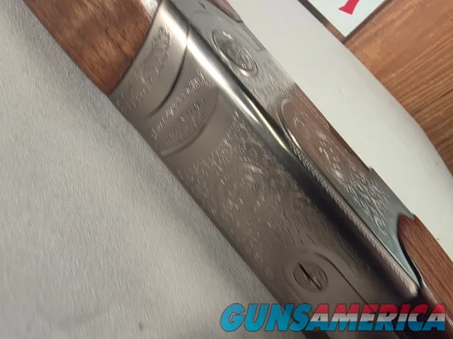 9402 Beretta Silver Pigeon I, 12 Gauge, 26” barrels, custom checkering, Screw in chokes, 3 SK, 2 Mod, full, 2 IC, 14 ½ LOP,
