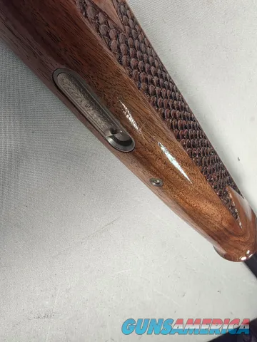 9402 Beretta Silver Pigeon I, 12 Gauge, 26” barrels, custom checkering, Screw in chokes, 3 SK, 2 Mod, full, 2 IC, 14 ½ LOP,