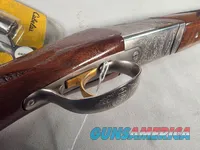 9402  Beretta Silver Pigeon I, 12 Gauge, 26” barrels, custom checkering, Screw in chokes, 3 SK, 2 Mod, full, 2 IC, 14 ½ LOP, 