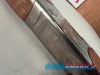 9402  Beretta Silver Pigeon I, 12 Gauge, 26” barrels, custom checkering, Screw in chokes, 3 SK, 2 Mod, full, 2 IC, 14 ½ LOP, 