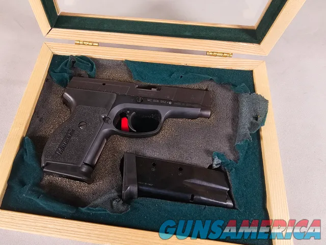 9109 Mauser Sig Sauer M2 45 Cal, Friends of NRA, 2 8 round magazines, display box with key, double action only, combat sights