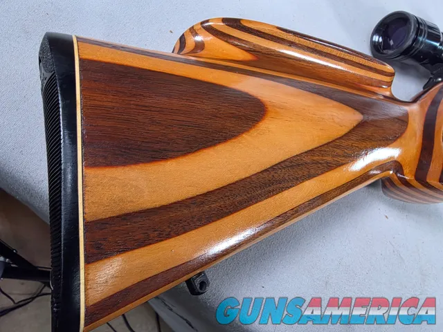 9380 Mauser Model 98 custom, 22-250, 24” barrel, bi pod, laminated stock, light trigger, custom bolt knob, cheek piece, tasco