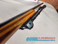9380 Mauser Model 98 custom, 22-250, 24” barrel, bi pod, laminated stock, light trigger, custom bolt knob, cheek piece, tasco