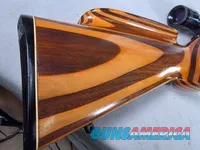 9380 Mauser Model 98 custom, 22-250, 24” barrel, bi pod, laminated stock, light trigger, custom bolt knob, cheek piece, tasco