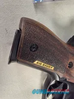 9488  Sig Sauer P229, 40 S+W, 3” Barrel, Night sights, 3-12 Round Magazines, Wood grips on it, with extra rubber grips. Can m