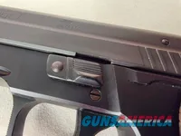 9488  Sig Sauer P229, 40 S+W, 3” Barrel, Night sights, 3-12 Round Magazines, Wood grips on it, with extra rubber grips. Can m