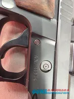 9488  Sig Sauer P229, 40 S+W, 3” Barrel, Night sights, 3-12 Round Magazines, Wood grips on it, with extra rubber grips. Can m