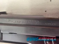 9488  Sig Sauer P229, 40 S+W, 3” Barrel, Night sights, 3-12 Round Magazines, Wood grips on it, with extra rubber grips. Can m