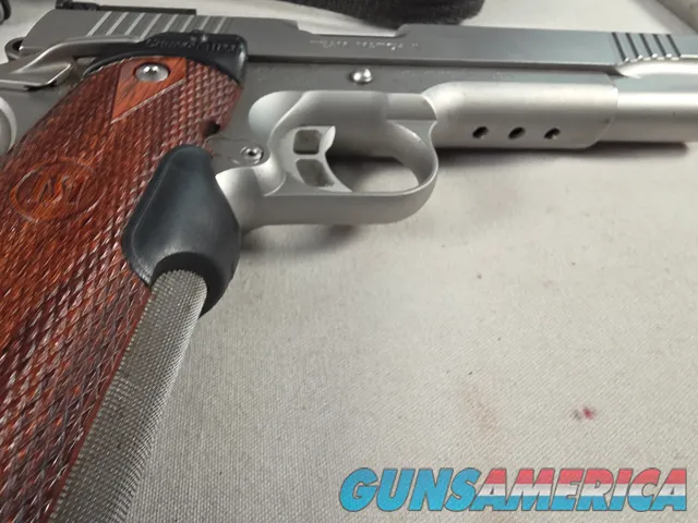 9443 Kimber Team Match II 9MM, 3 mags, 2 holsters, pouch, 2 sets of wood grips, adjustable rear sight, crimson trace laser.  