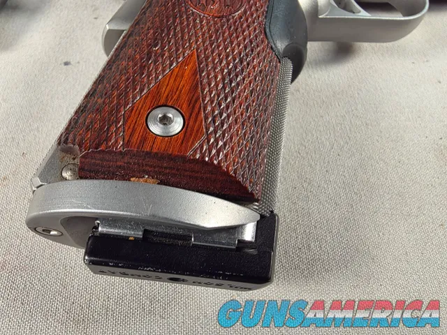 9443 Kimber Team Match II 9MM, 3 mags, 2 holsters, pouch, 2 sets of wood grips, adjustable rear sight, crimson trace laser.  