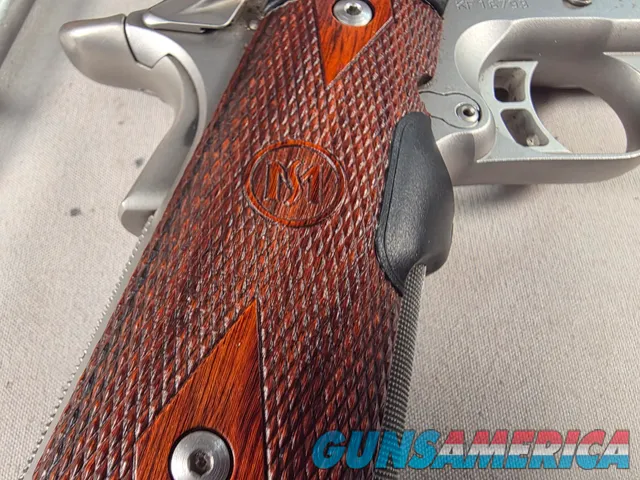 9443 Kimber Team Match II 9MM, 3 mags, 2 holsters, pouch, 2 sets of wood grips, adjustable rear sight, crimson trace laser.  
