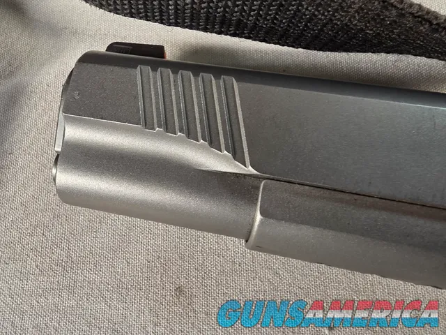 9443 Kimber Team Match II 9MM, 3 mags, 2 holsters, pouch, 2 sets of wood grips, adjustable rear sight, crimson trace laser.  
