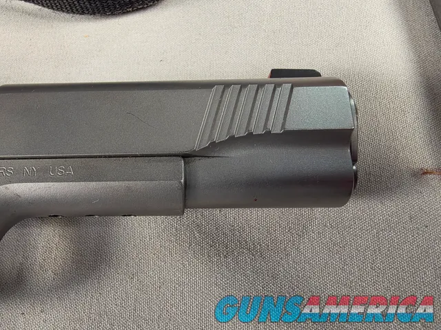 9443 Kimber Team Match II 9MM, 3 mags, 2 holsters, pouch, 2 sets of wood grips, adjustable rear sight, crimson trace laser.  