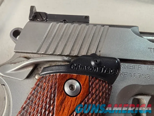 9443 Kimber Team Match II 9MM, 3 mags, 2 holsters, pouch, 2 sets of wood grips, adjustable rear sight, crimson trace laser.  
