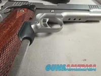 9443 Kimber Team Match II 9MM, 3 mags, 2 holsters, pouch, 2 sets of wood grips, adjustable rear sight, crimson trace laser.  