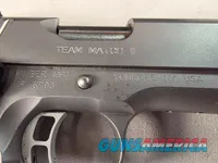 9443 Kimber Team Match II 9MM, 3 mags, 2 holsters, pouch, 2 sets of wood grips, adjustable rear sight, crimson trace laser.  