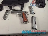 9443 Kimber Team Match II 9MM, 3 mags, 2 holsters, pouch, 2 sets of wood grips, adjustable rear sight, crimson trace laser.  