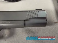 9443 Kimber Team Match II 9MM, 3 mags, 2 holsters, pouch, 2 sets of wood grips, adjustable rear sight, crimson trace laser.  