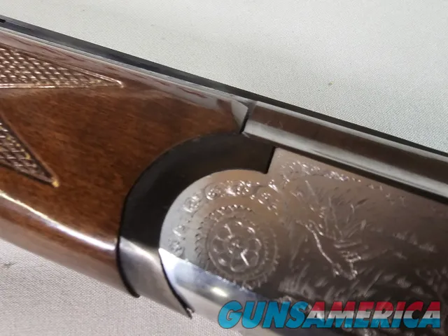9069  A. V. Maurcini 12 Gauge 28” Mod/FULL, double triggers, ejectors, brass front bead, dogs and ducks, pheasants on receive