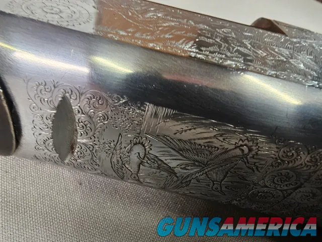9069  A. V. Maurcini 12 Gauge 28” Mod/FULL, double triggers, ejectors, brass front bead, dogs and ducks, pheasants on receive