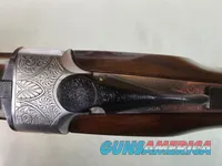 9069  A. V. Maurcini 12 Gauge 28” Mod/FULL, double triggers, ejectors, brass front bead, dogs and ducks, pheasants on receive