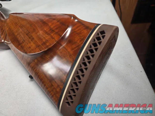 9374 Browning Medallion, 7MM, 22” barrel, rosewood grip and forarm tip, muzzle brake, Leopold VX III HD 4.5x14x50, More pic