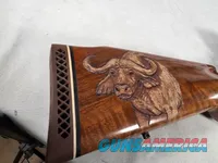 9374  Browning Medallion, 7MM, 22” barrel, rosewood grip and forarm tip, muzzle brake, Leopold VX III  HD 4.5x14x50, More pic