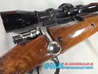 9374  Browning Medallion, 7MM, 22” barrel, rosewood grip and forarm tip, muzzle brake, Leopold VX III  HD 4.5x14x50, More pic