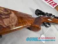 9374  Browning Medallion, 7MM, 22” barrel, rosewood grip and forarm tip, muzzle brake, Leopold VX III  HD 4.5x14x50, More pic