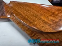 9374  Browning Medallion, 7MM, 22” barrel, rosewood grip and forarm tip, muzzle brake, Leopold VX III  HD 4.5x14x50, More pic