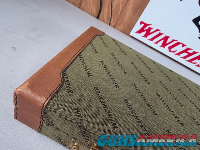 9449 Winchester Shotgun hard trunk style case. Green exterior with green interior, Has a spacing block and the original keys.