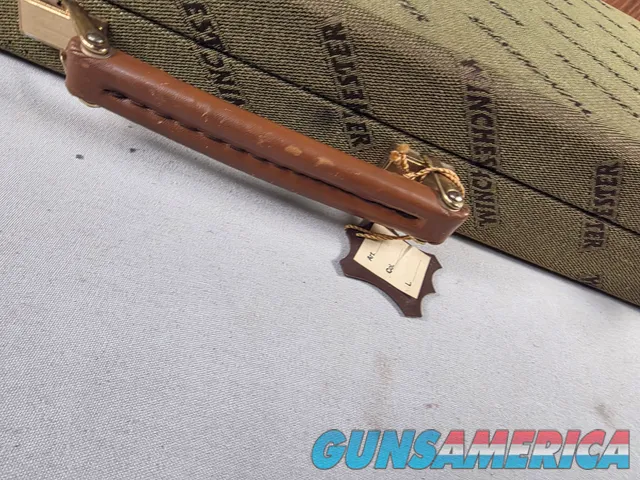 9449 Winchester Shotgun hard trunk style case. Green exterior with green interior, Has a spacing block and the original keys.