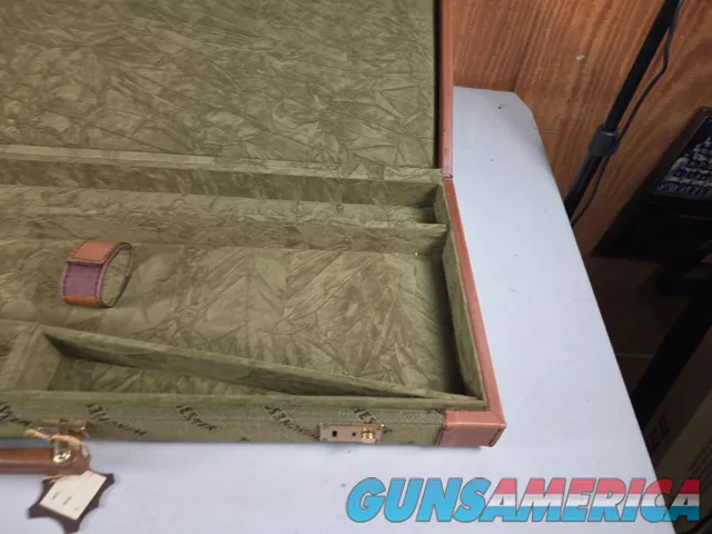 9449 Winchester Shotgun hard trunk style case. Green exterior with green interior, Has a spacing block and the original keys.