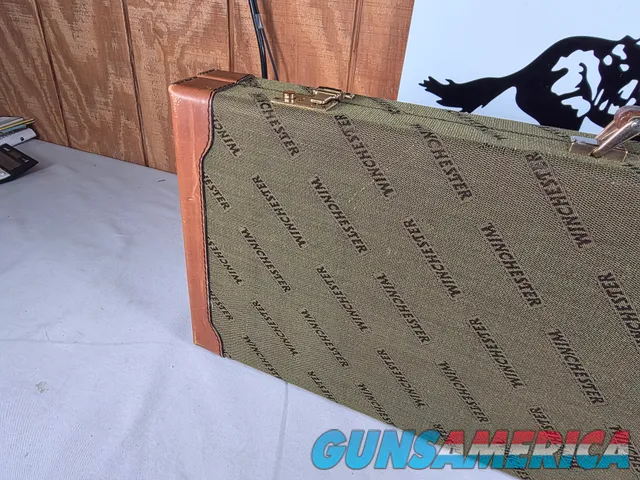 9449 Winchester Shotgun hard trunk style case. Green exterior with green interior, Has a spacing block and the original keys.