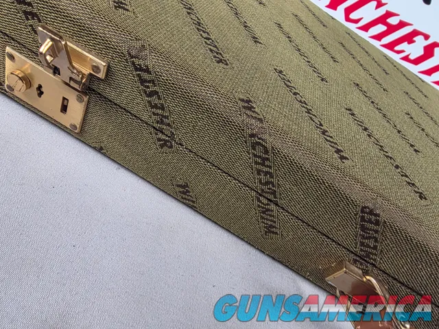 9449 Winchester Shotgun hard trunk style case. Green exterior with green interior, Has a spacing block and the original keys.