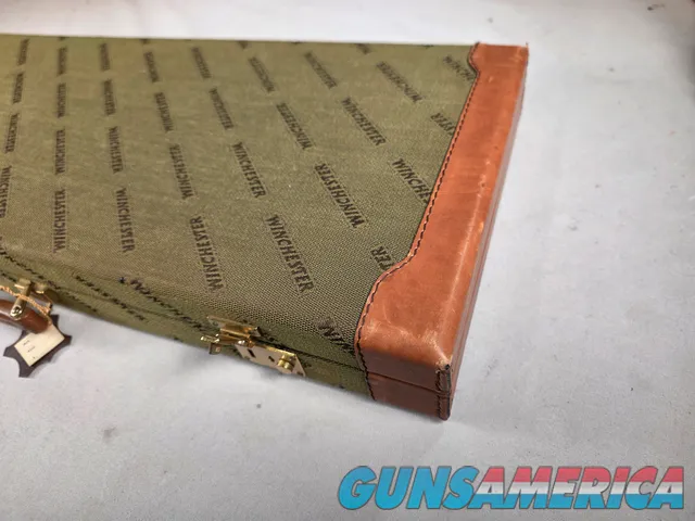 9449 Winchester Shotgun hard trunk style case. Green exterior with green interior, Has a spacing block and the original keys.