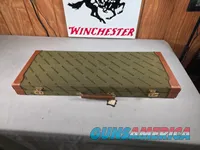 9449 Winchester Shotgun hard trunk style case. Green exterior with green interior, Has a spacing block and the original keys.