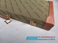 9449 Winchester Shotgun hard trunk style case. Green exterior with green interior, Has a spacing block and the original keys.