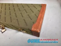 9449 Winchester Shotgun hard trunk style case. Green exterior with green interior, Has a spacing block and the original keys.