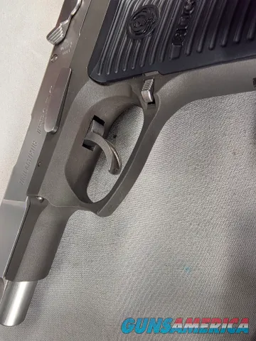 9494 Ruger P89DC, 9MM, 2 Tone, 2 mags with loader assist. Really good condition. Has the original box and all paperwork.