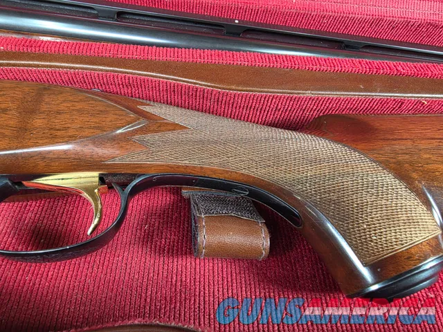 9208&nbsp; Winchester 23 Classic, 20 Gauge, 2 ¾ and 3”, 26” barrels, IC/Mod, 14 ½ lop, butt pad, vent rib, beautiful wood, gold tr