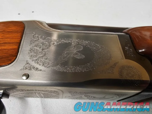 9042 Winchester 101 XTR Lightweight, 12 gauge, Winchokes comes with (IC/MOD) more are available at additional cost, pistol gr