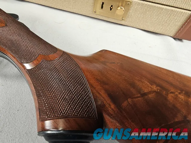 9111  Classic Doubles 12 gauge, 26 “ Barrels, IC/MOD, AA++ Marbled Walnut, Butt pad, vent rib, ejectors, Pistol grip with cap
