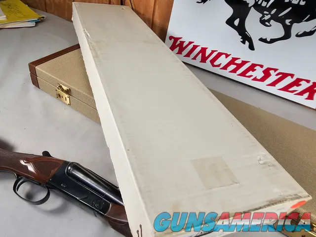 9111  Classic Doubles 12 gauge, 26 “ Barrels, IC/MOD, AA++ Marbled Walnut, Butt pad, vent rib, ejectors, Pistol grip with cap