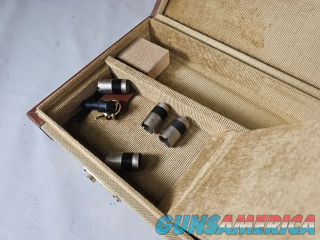 9111  Classic Doubles 12 gauge, 26 “ Barrels, IC/MOD, AA++ Marbled Walnut, Butt pad, vent rib, ejectors, Pistol grip with cap